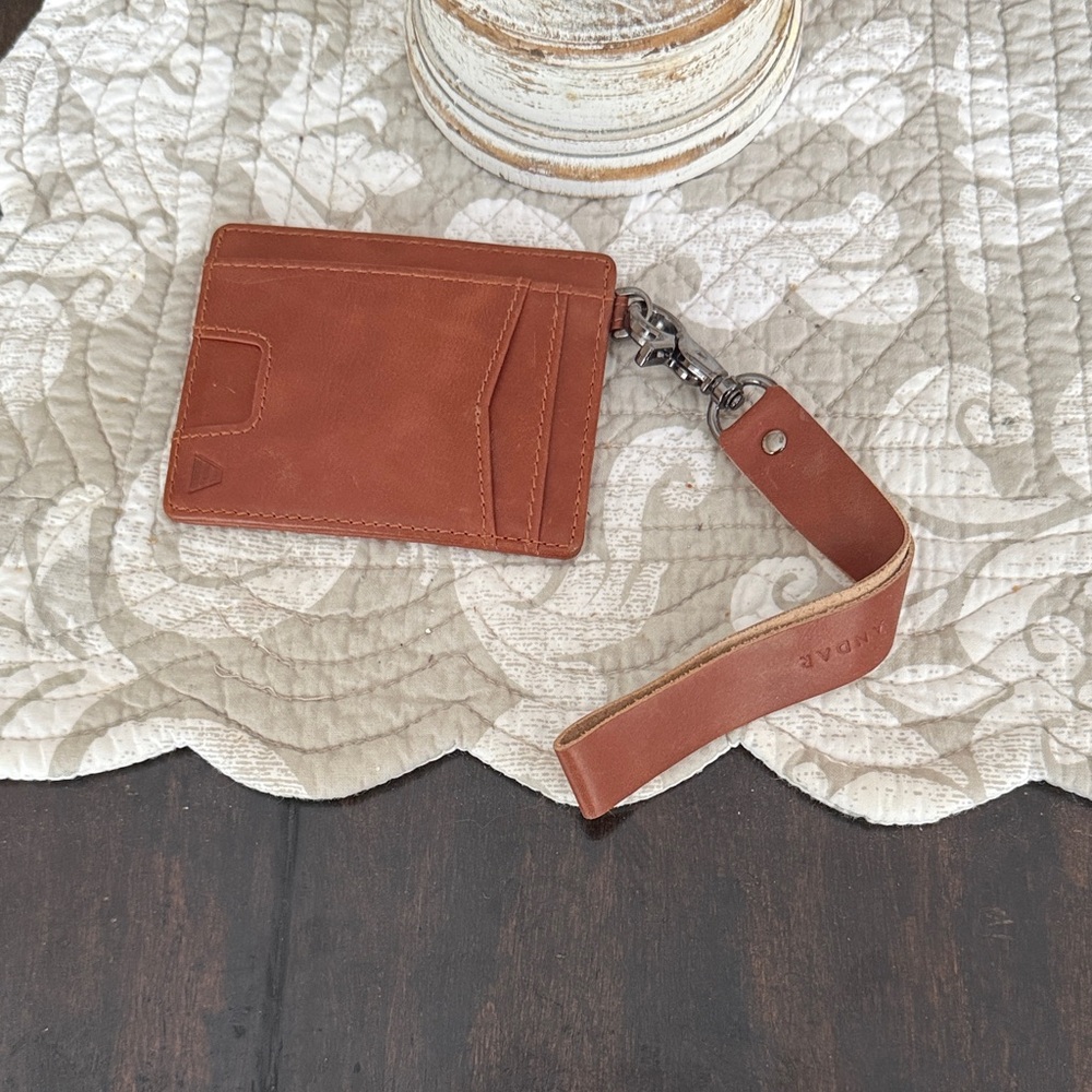 Andar Denner wristlet in Cognac Brown Leather